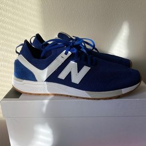 Two New Balance sneakers.  Grey&Blue